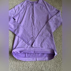 Small purple FIGS underscrub top.